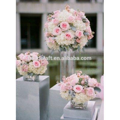 Tall White Rose and Hydrangea Centerpiece in a silver lined vase for the other half of the centerpieces at the reception