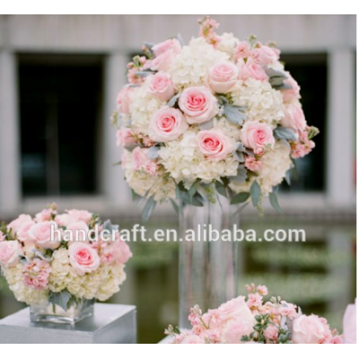 Blush and white tall centerpiece. Dahlias, hydrangea, curly willow, roses, stock, dusty miler