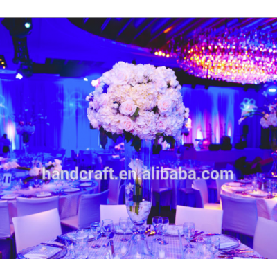 Tall White Centerpiece in a silver lined vase