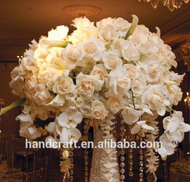 White Wedding Orchids Centerpiece in a silver lined vase for the other half of the centerpieces at the reception