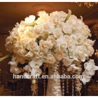 White Wedding Orchids Centerpiece in a silver lined vase for the other half of the centerpieces at the reception